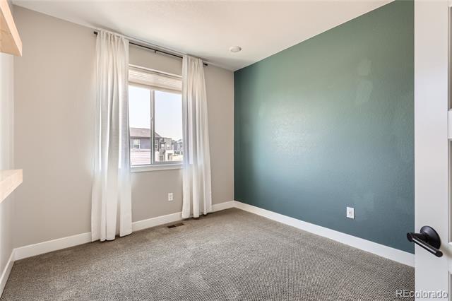 Building Photo - 1565 W 67th Ave