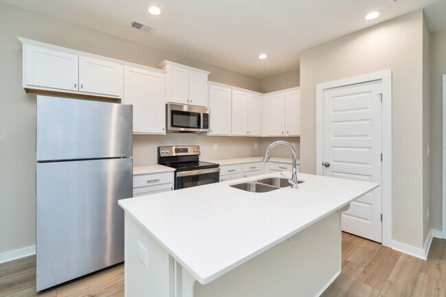 Building Photo - Move-In Special! Pay only ½ of your first ...