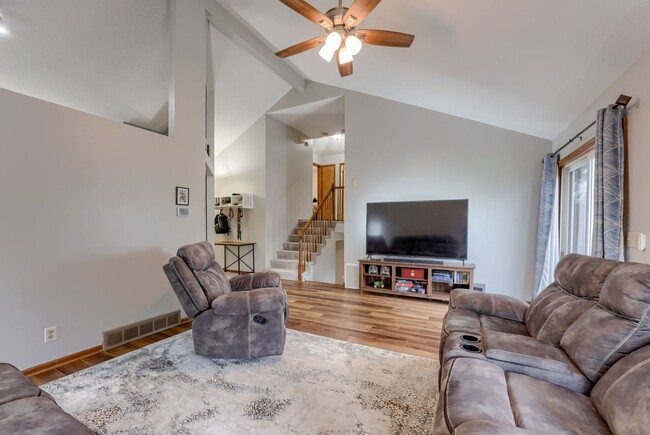 Building Photo - Bright & Airy Tri-Level With Finished Base...