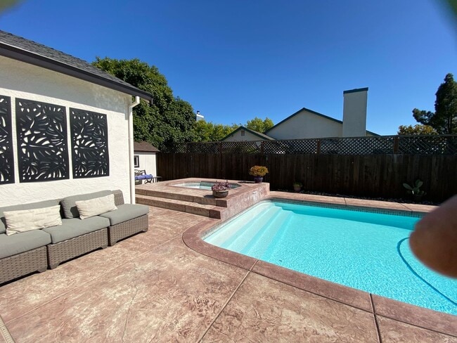 Building Photo - Stunning Home with Backyard Oasis with inground pool and spa