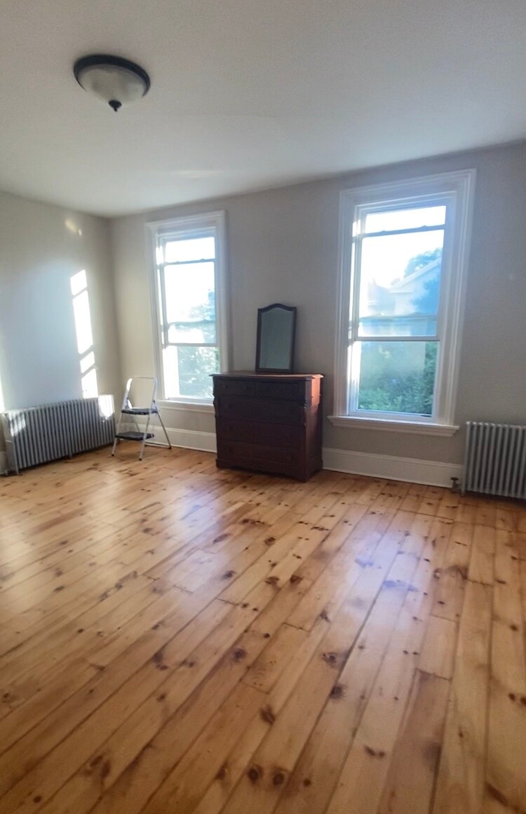 Bedroom #3 has two big windows that overlook tree-lined Pearl Street - 55 Pearl St