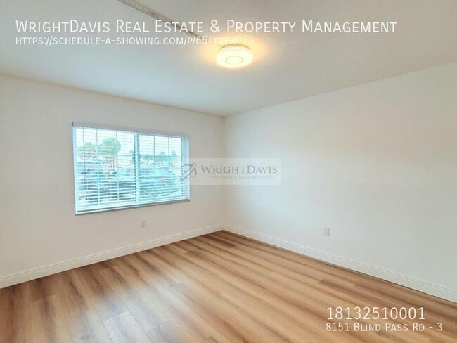 Building Photo - 8151 Blind Pass Rd