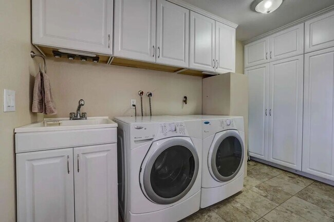 Building Photo - 1/2 acre in the with RV Hook ups