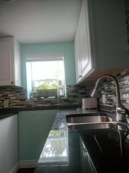 Building Photo - 7655 E 19th Ave