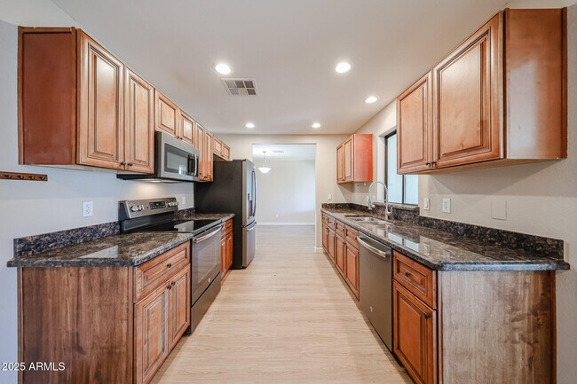 Building Photo - 6539 E Arbor Ave