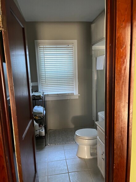 Bathroom with tiled floor - 719 W 2nd St