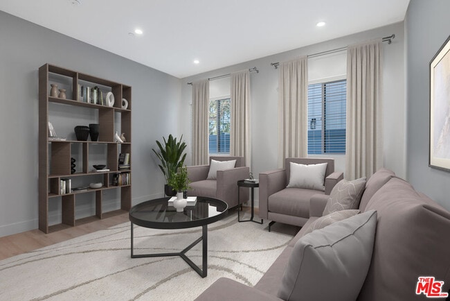 Building Photo - 8670 Encino Ave