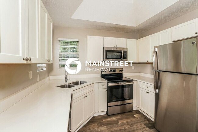 Building Photo - 4 Bedroom Pet-Friendly Home in Riverdale, GA with Main Street Renewal