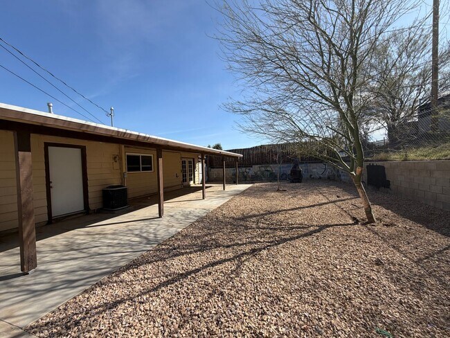 Building Photo - 3 Bedroom 2 Bathroom House with Central A/C , 2 Car Garage and Beautiful Backyard with Covered Patio