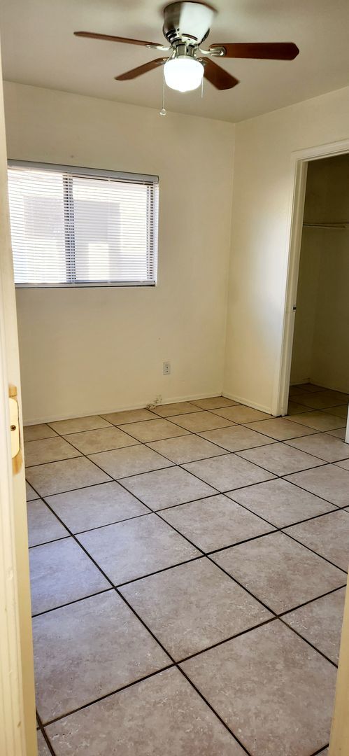 Building Photo - Large 4 Bedroom- A/C- All Ceramic Tile- Wo...