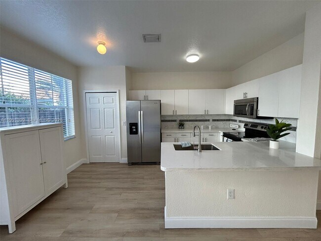 Building Photo - 12515 SW 124th Path