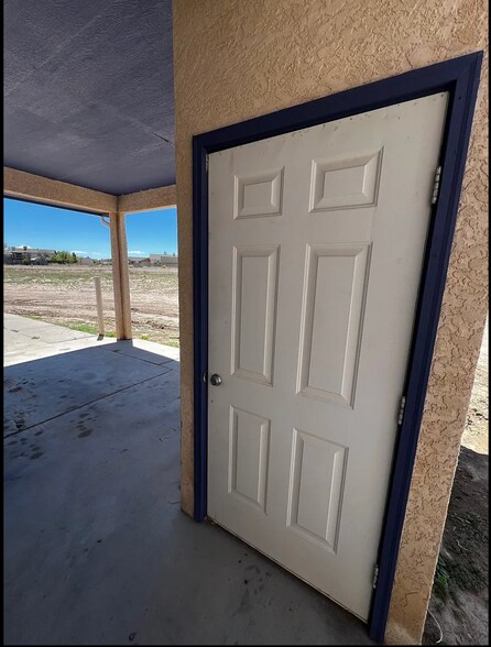 Outdoor storage closet with shelves - 593 S Aguilar Dr