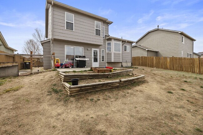 Building Photo - Spacious 4-Bedroom Home with Fenced Yard, 2-Car Garage & Scenic Views in Cheyenne Meadows