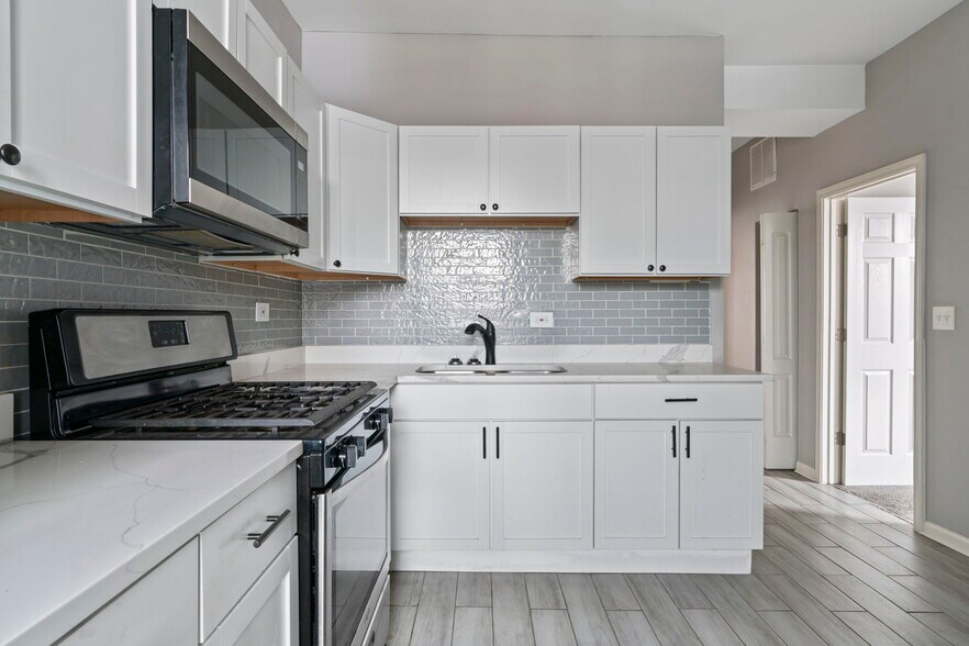 Building Photo - 7028 S Peoria St