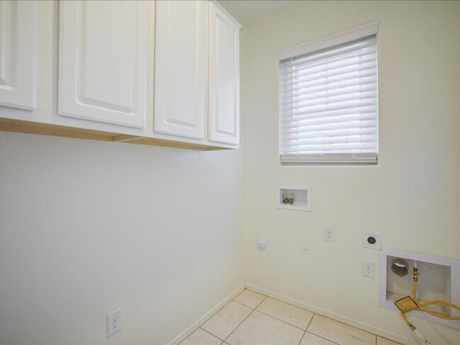 Building Photo - Bright & Spacious 3-Bedroom Home with Open-Concept Living and Community Pool