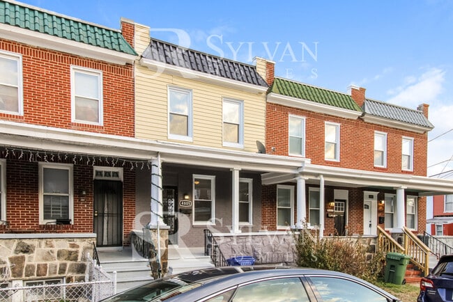 Building Photo - Welcome to this charming abode.