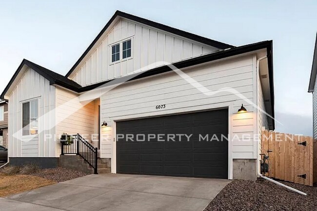 Primary Photo - Stylish Main-Level Living with Finished Ba...