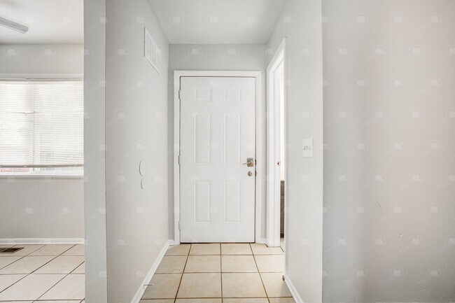 Building Photo - **Spacious 3-Bedroom Townhome with Partially Finished Basement and Off-Street Parking**