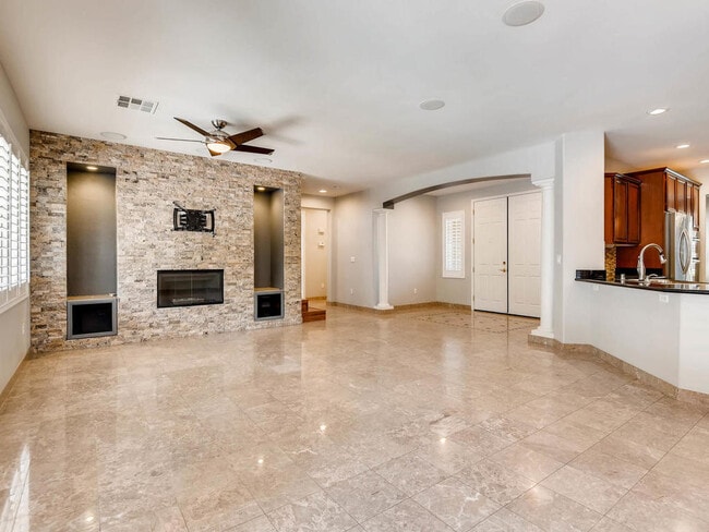 Building Photo - LUXURIOUS UPGRADED HOME IN A GATED SUMMERLIN AREA!!HOUSE HAS POOL AND SPA AND PATIO COVERED BACKY...