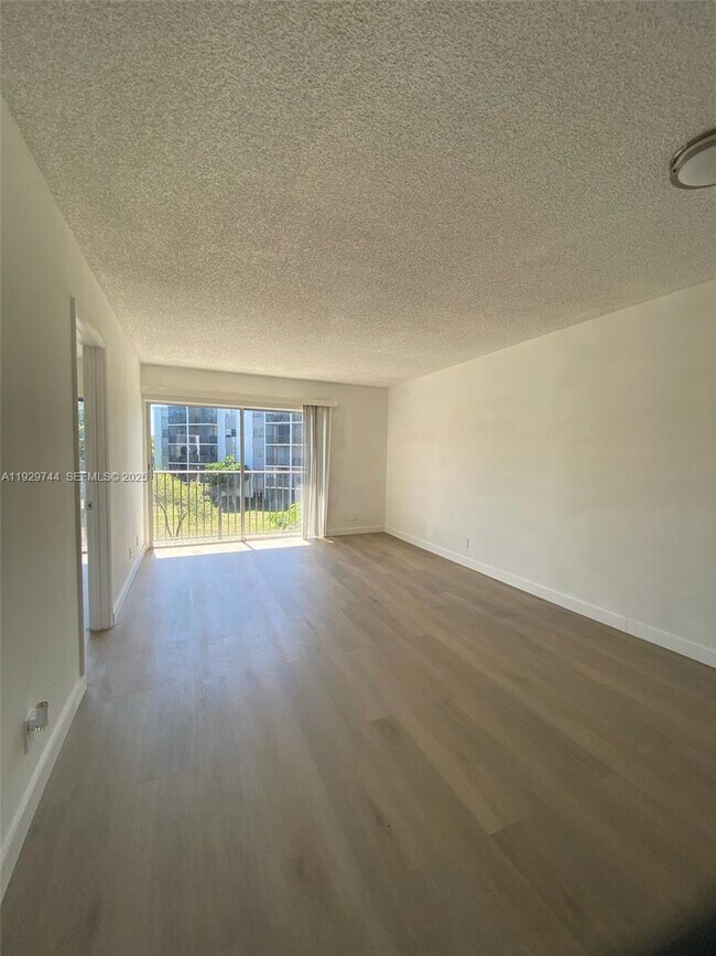 Building Photo - 8740 N Sherman Cir