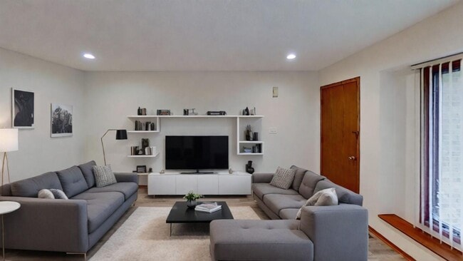 Building Photo - Updated 2BR/1BA duplex with office in partially finished basement, detached garage and across fro...