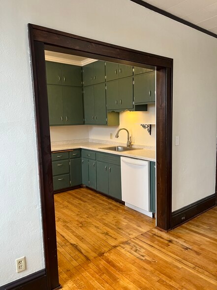 Kitchen From Dining - 415 E Saint Germain St