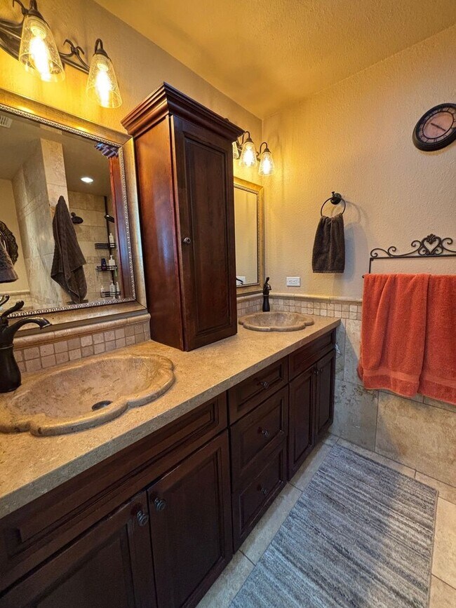 Building Photo - Welcome to this stunning updated 2-bedroom, 2-bathroom home on a lake located in the vibrant comm...