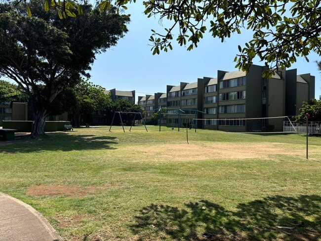 Building Photo - Harbor Lights 1-Bedroom – Pool, Courtyard, & Steps to Shopping