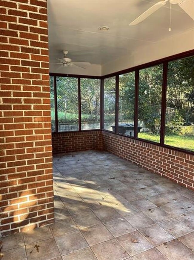 Building Photo - 2 Living Spaces and Carport