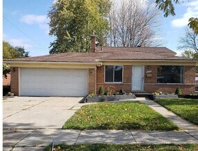 Building Photo - Welcome home!!  Well maintained 4 bedroom tri level home
