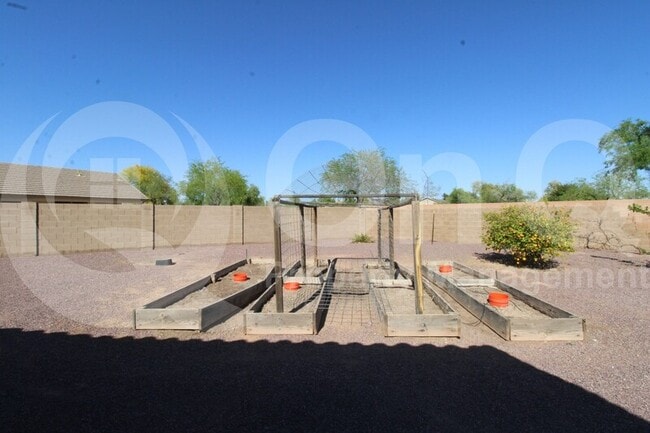 Building Photo - 9953 E Onza Ave