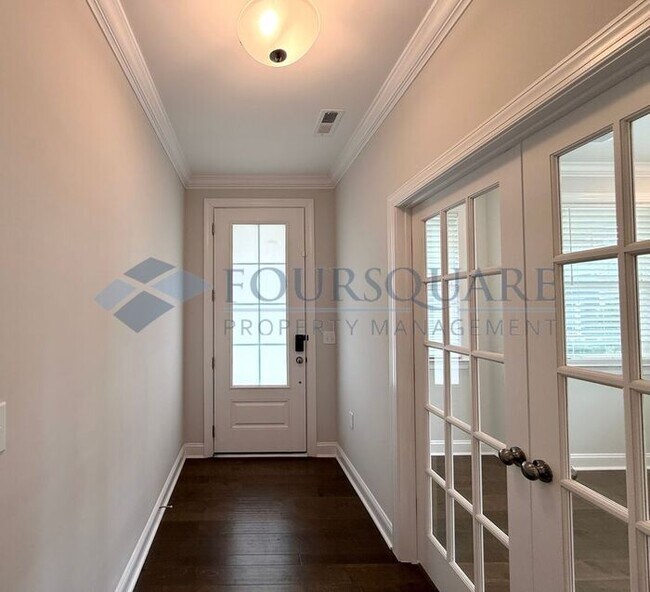Building Photo - Spacious Corner-Lot Home with Guest Suite, Screened Porch & Detached 2-Car Garage – Resort-Style ...