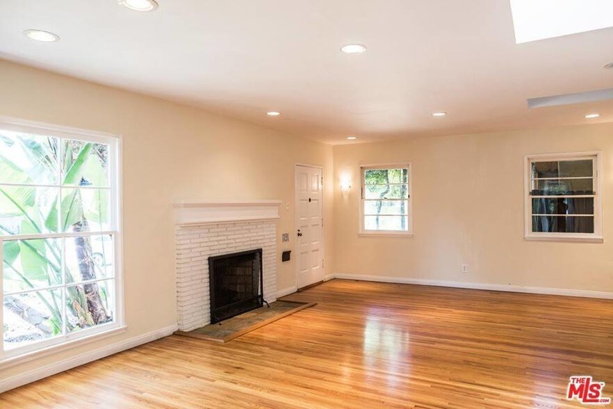 Main Living room- has two sky lights - 3864 Girard Ave
