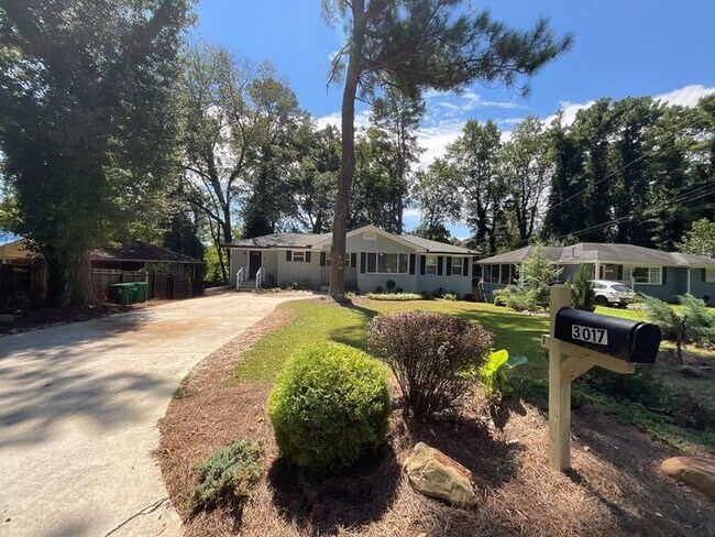 Primary Photo - **Spacious 4BR with Modern Upgrades & Cove...