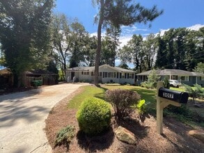 Building Photo - **Spacious 4BR with Modern Upgrades & Cove...