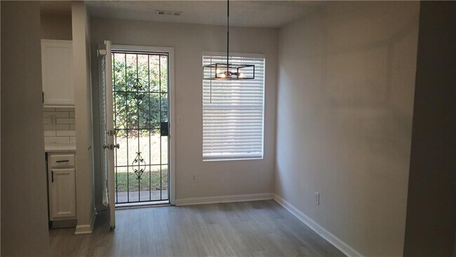 Building Photo - 5677 Wind Gate Ln