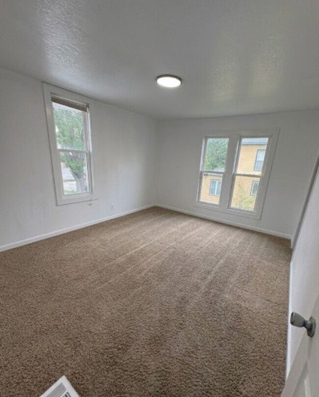 Building Photo - Updated 2 Bed, 2 Bath House for Rent with 2 Stall Garage!!!