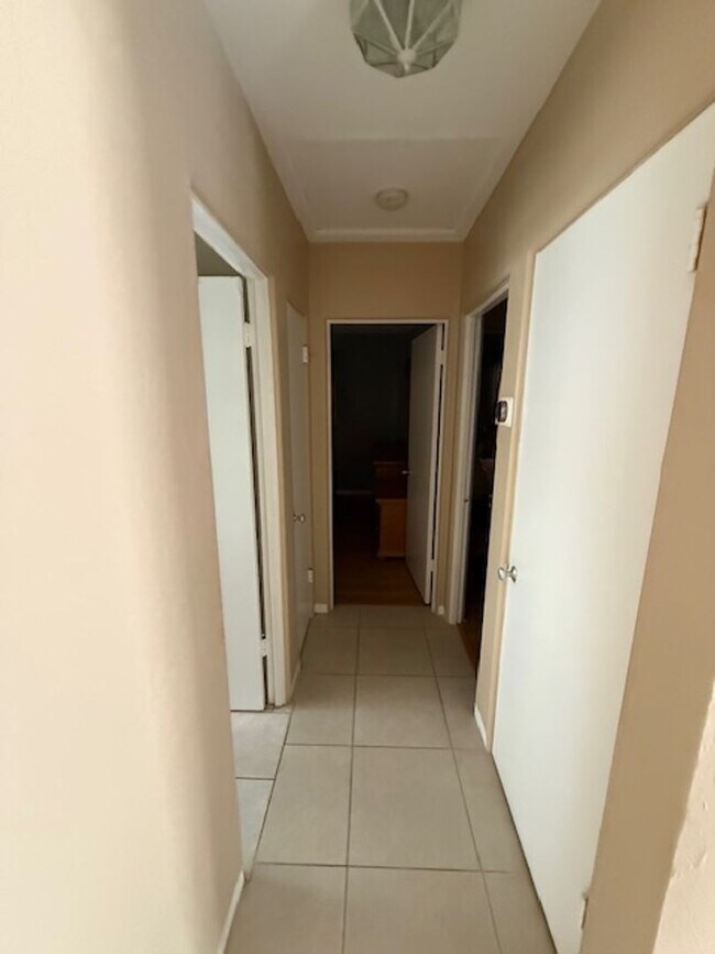 Building Photo - Well maintained 2/2 with a large yard in a...
