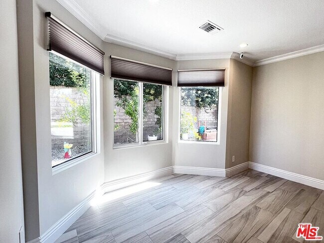 Building Photo - 10758 Cozycroft Ave