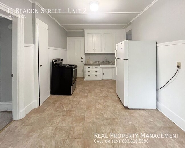 Building Photo - 1st Floor, 2 BR/1BA Apartment Available in...