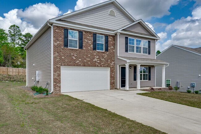 Building Photo - This home in Spring Haven is the perfect place to start your next chapter!