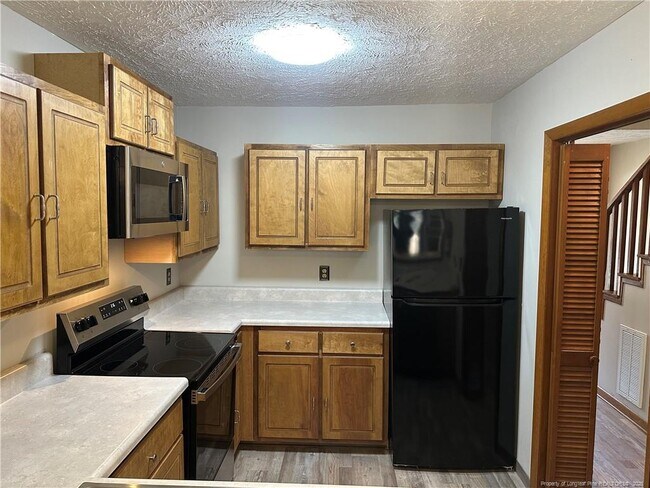 Building Photo - 1202 Huntsman Ct