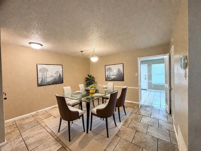 Building Photo - Single-level living on ground floor  |  Fresh paint (July 2026)  |  2 carports  |  Community Pool...