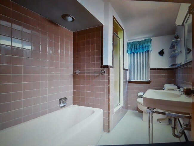 upstair bathroom with standing shower and Bathtub - 2203 Forest Ave