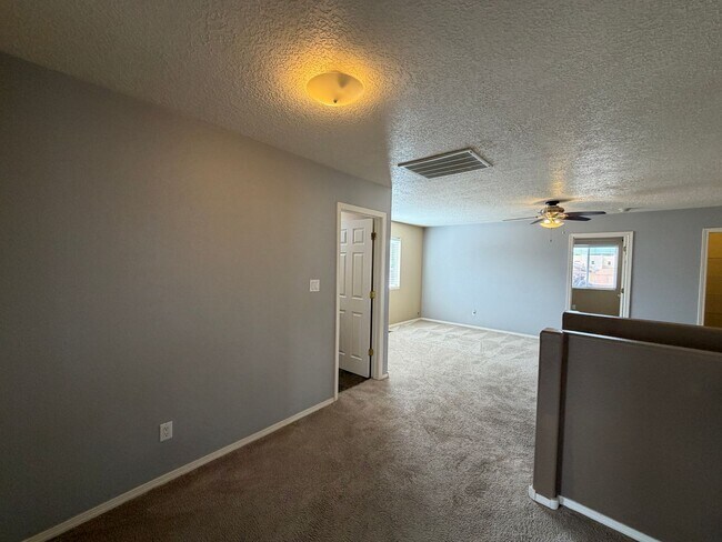 Building Photo - 4 Bedroom Home Available Near McMahon Blvd NW & Universe Blvd NW!