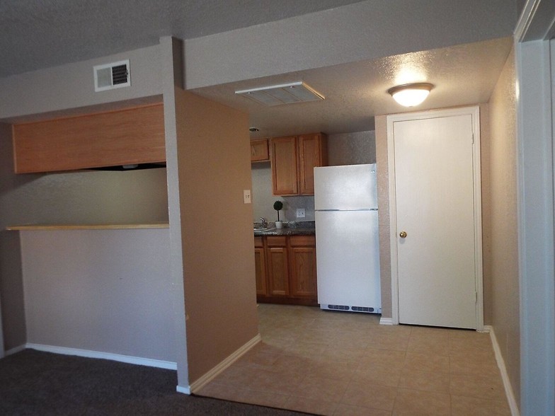 Living room/Kitchen - Santa Fe Apartments