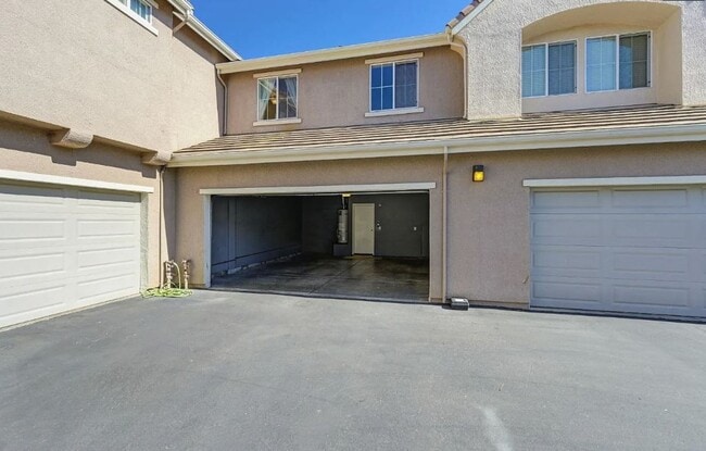 Building Photo - Experience Esplanade! Premier Townhome Com...