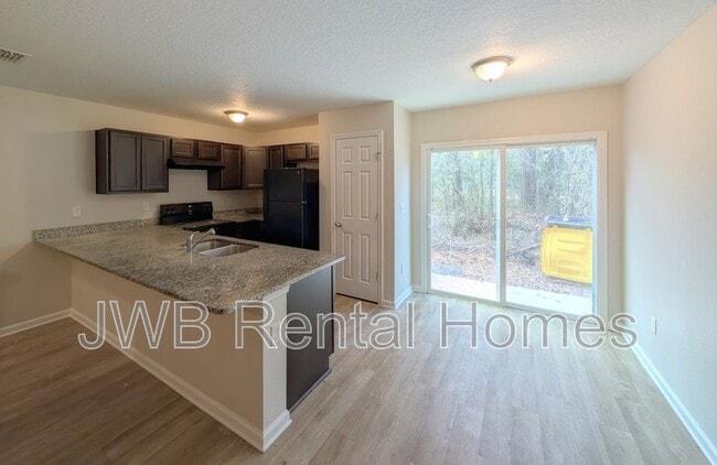 Building Photo - 7876 Playschool Ln