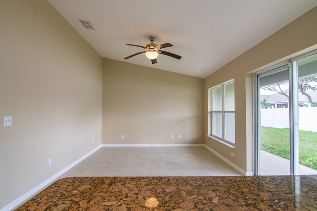 Building Photo - 4/3 Duplex Home in Poinciana Available, April 2026