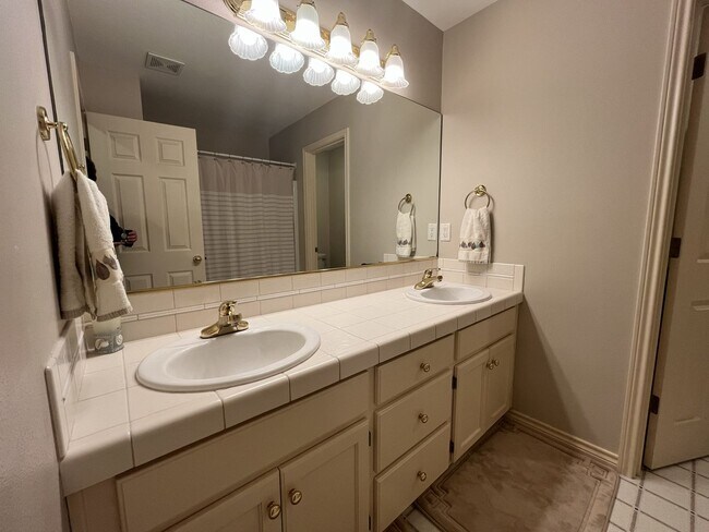 Building Photo - Executive-Style Northwest Heights Home with Forest Views and Refined Architectural Details